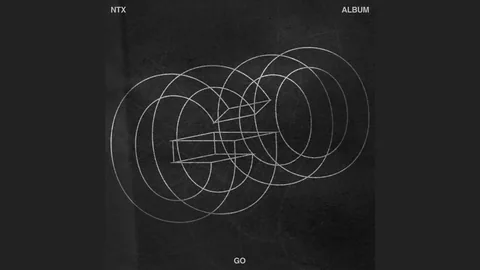 Cover of the NTX single GO: white outline lettering spelling GO on a black textured background